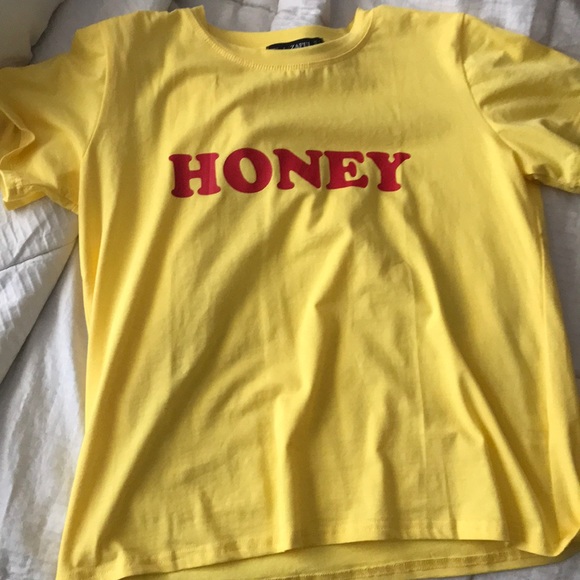 yellow and red graphic tee